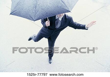 people, balance, umbrella, rain, rainy View Large Photo Image Stock Photo - people, balance, umbrella, rain, rainy. Fotosearch