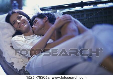 people, couple, happy, lying down, brunette View Large Photo Image Stock Image - people, couple, happy, lying down, brunette. Fotosearch