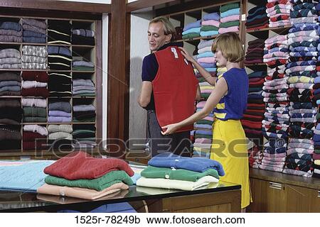 Stock Image - people, couple, lifestyles, shopping, indoors, Caucasian, shoppers. Fotosearch