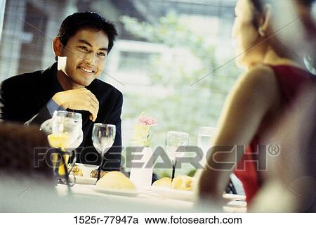 people, glasses, talking, Asian, couple, conversation View Large Photo Image Stock Image - people, glasses, talking, Asian, couple, conversation. Fotosearch