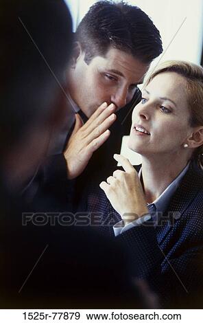 people, hand, gesturing, secretive, business, whispering, gesture View Large Photo Image Stock Photo - people, hand, gesturing, secretive, business, whispering, gesture. Fotosearch