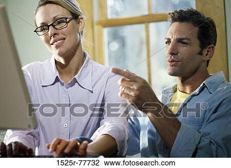 people, home, couple, eyeglasses, technology, computer View Large Photo Image Stock Image - people, home, couple, eyeglasses, technology, computer. Fotosearch
