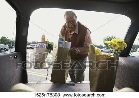 people, senior, car, outdoors, shopping View Large Photo Image Stock Photo - people, senior, car, outdoors, shopping. Fotosearch