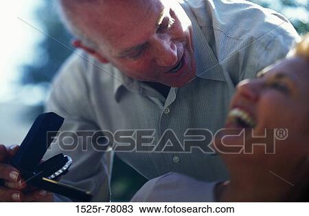 people, smiling, couple, senior, laughing, bracelet View Large Photo Image Stock Image - people, smiling, couple, senior, laughing, bracelet. Fotosearch