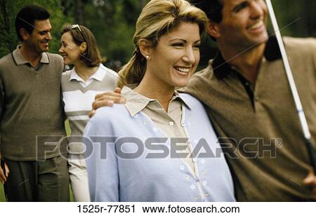 people, smiling, golf, sunglasses, outdoors, sports View Large Photo Image Stock Image - people, smiling, golf, sunglasses, outdoors, sports. Fotosearch