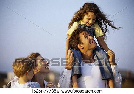 people, smiling, laughing, holding, outdoors, carrying View Large Photo Image Stock Image - people, smiling, laughing, holding, outdoors, carrying. Fotosearch