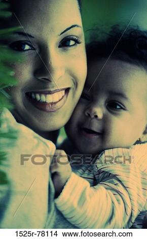 people, smiling, mother, baby, outdoors, smile, family View Large Photo Image Picture - people, smiling, mother, baby, outdoors, smile, family. Fotosearch