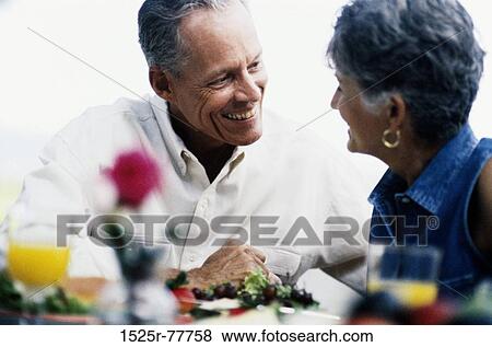 people, smiling, table, talking, couple, conversation View Large Photo Image Stock Photo - people, smiling, table, talking, couple, conversation. Fotosearch