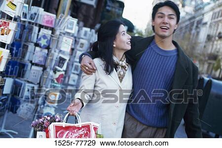 people, smiling, walking, Asian, couple, outdoors View Large Photo Image Stock Photo - people, smiling, walking, Asian, couple, outdoors. Fotosearch