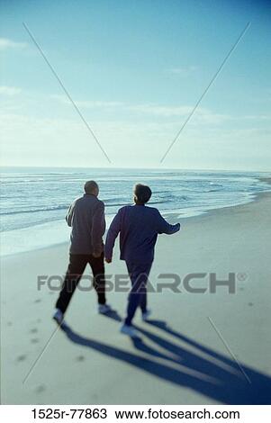 people, walking, couple, senior, beach, health, tide View Large Photo Image Stock Image - people, walking, couple, senior, beach, health, tide. Fotosearch