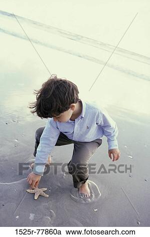 people, water, beach, boy, curious, child, barefoot View Large Photo Image Stock Image - people, water, beach, boy, curious, child, barefoot. Fotosearch