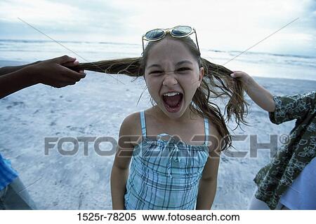 people, water, beach, sunglasses, pulling, children View Large Photo Image Stock Photography - people, water, beach, sunglasses, pulling, children. Fotosearch