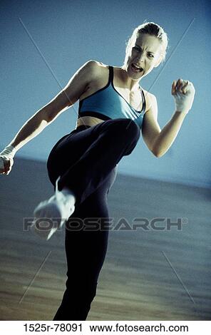 Stock Image - people, woman, sports, exercise, blond, exercising. Fotosearch