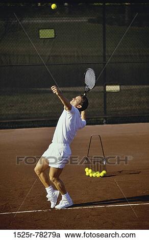 Stock Image - playing, tennis racket, tennis, sports, accuracy, racket. Fotosearch