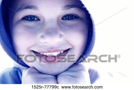 Portrait of a girl wearing a hooded shirt View Large Photo Image Stock Image - Portrait of a girl wearing a hooded shirt. Fotosearch