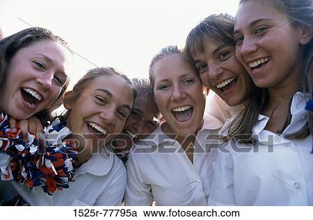 Portrait of a group of teenage girls smiling View Large Photo Image Stock Image - Portrait of a group of teenage girls smiling. Fotosearch