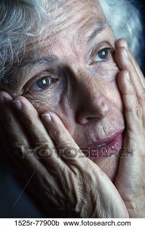 Portrait of a senior woman looking worried View Large Photo Image Stock Image - Portrait of a senior woman looking worried. Fotosearch