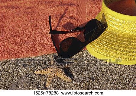 sand, relaxation, beach, sunglasses, visor, towel View Large Photo Image Stock Photo - sand, relaxation, beach, sunglasses, visor, towel. Fotosearch