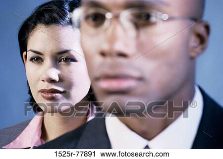 Stock Image - staring, eyeglasses, business, diversity, serious, stare. Fotosearch
