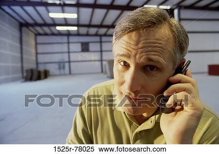 Stock Photography - telephone, phone, business, Middle-aged, warehouse. Fotosearch
