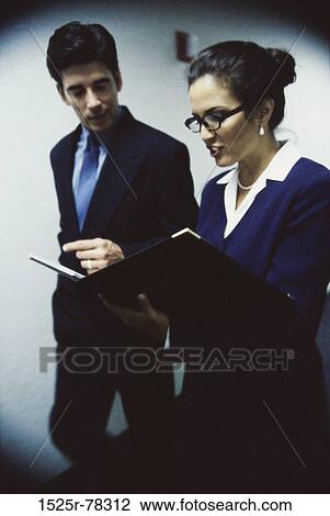 walking, talking, discussion, eyeglasses, conversation, folder, business View Large Photo Image Stock Image - walking, talking, discussion, eyeglasses, conversation, folder, business. Fotosearch