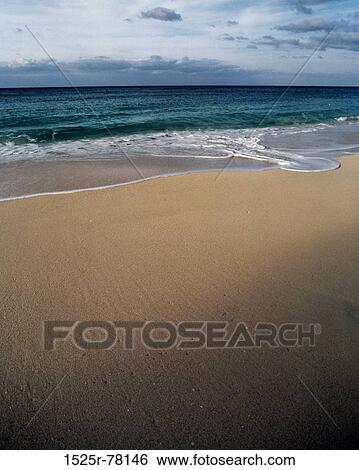 Waves breaking on the beach View Large Photo Image Stock Photograph - Waves breaking on the beach. Fotosearch