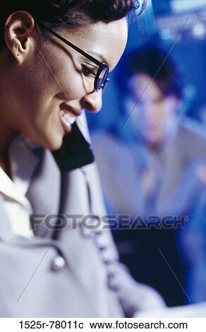 Stock Image - woman, telephone, phone, business, businesswoman. Fotosearch
