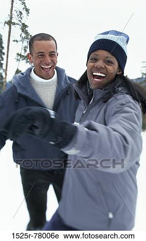 Young couple laughing View Large Photo Image Stock Image - Young couple laughing. Fotosearch