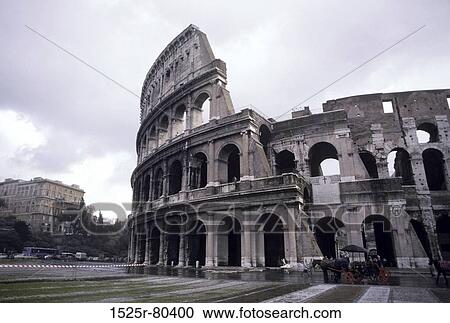 Carriage in front of ruins of an amphitheater, Colosseum, Rome, Italy View Large Photo Image Stock Image - Carriage in front of ruins of an amphitheater, Colosseum, Rome, Italy. Fotosearch