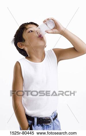 Close-up of a boy drinking milk View Large Photo Image Stock Photography - Close-up of a boy drinking milk. Fotosearch