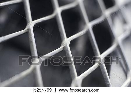 Close-up of a chain-link fence View Large Photo Image Stock Image - Close-up of a chain-link fence. Fotosearch