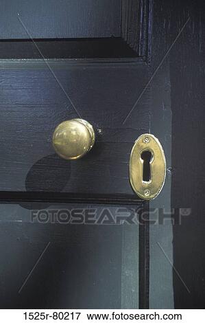 Close-up of a doorknob and keyhole on a door View Large Photo Image Stock Photo - Close-up of a doorknob and keyhole on a door. Fotosearch