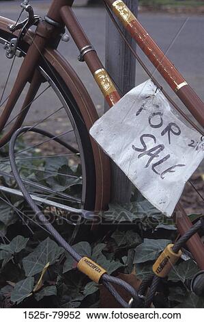 Close-up of a For Sale sign on a bicycle View Large Photo Image Stock Image - Close-up of a For Sale sign on a bicycle. Fotosearch