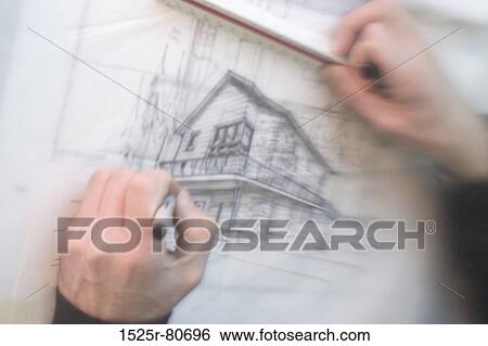 Close-up of a human hand making a blueprint View Large Photo Image Stock Photograph - Close-up of a human hand making a blueprint. Fotosearch