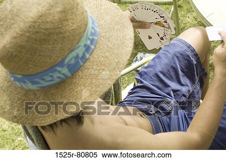 Close-up of a man playing cards View Large Photo Image Stock Photography - Close-up of a man playing cards. Fotosearch