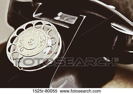 Close-up of a rotary phone View Large Photo Image Stock Photography - Close-up of a rotary phone. Fotosearch