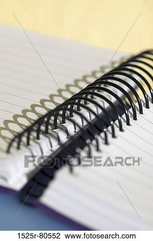 Stock Image - Close-up of a spiral notebook. Fotosearch