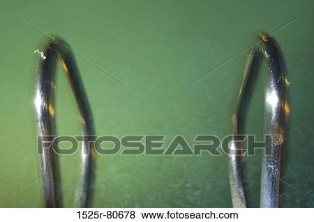 Close-up of a swimming pool ladder View Large Photo Image Stock Photo - Close-up of a swimming pool ladder. Fotosearch