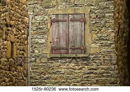 Close-up of a window on a stone wall View Large Photo Image Stock Photograph - Close-up of a window on a stone wall. Fotosearch