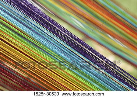 Close-up of colorful threads View Large Photo Image Stock Photo - Close-up of colorful threads. Fotosearch