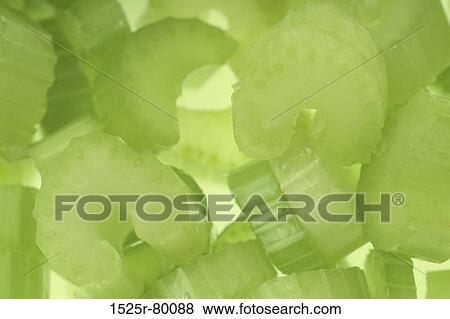 Close-up of slices of celery View Large Photo Image Stock Photo - Close-up of slices of celery. Fotosearch