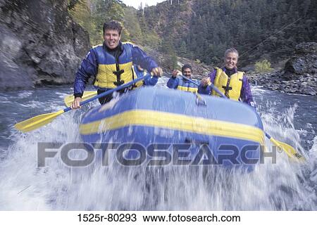 Four young people paddling an inflatable raft View Large Photo Image Stock Image - Four young people paddling an inflatable raft. Fotosearch