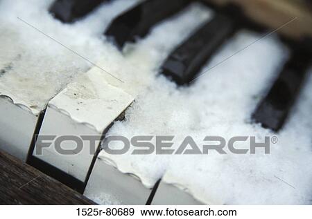 High angle view of a piano covered with snow View Large Photo Image Stock Photo - High angle view of a piano covered with snow. Fotosearch