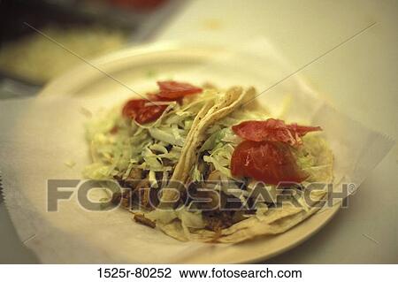 High angle view of two soft tacos View Large Photo Image Stock Image - High angle view of two soft tacos. Fotosearch