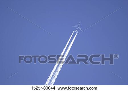 Low angle view of a jet fighter in flight View Large Photo Image Picture - Low angle view of a jet fighter in flight. Fotosearch