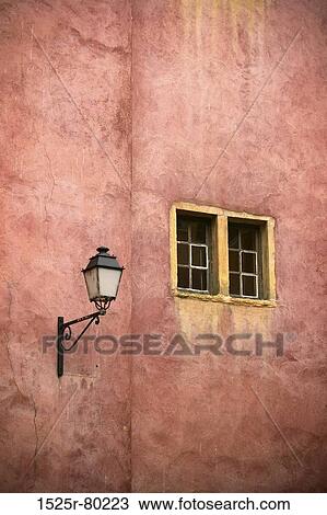 Low angle view of a lantern mounted on a wall View Large Photo Image Stock Image - Low angle view of a lantern mounted on a wall. Fotosearch