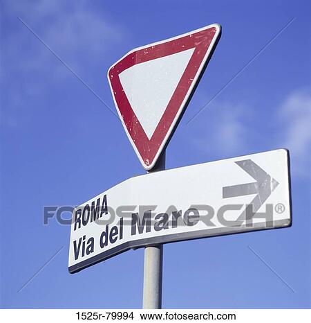 Low angle view of a sign board View Large Photo Image Picture - Low angle view of a sign board. Fotosearch