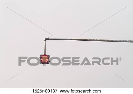 Low angle view of a stoplight View Large Photo Image Stock Photo - Low angle view of a stoplight. Fotosearch