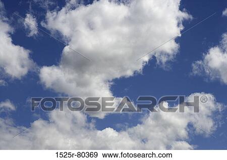 Low angle view of clouded sky View Large Photo Image Stock Photo - Low angle view of clouded sky. Fotosearch