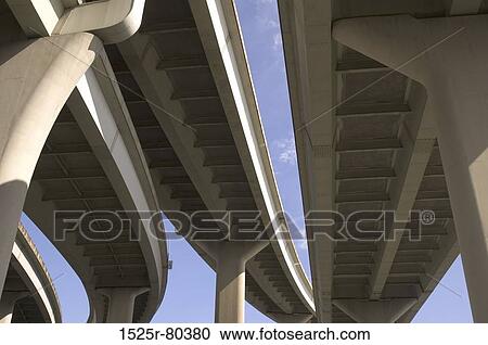 Low angle view of overpasses View Large Photo Image Stock Image - Low angle view of overpasses. Fotosearch
